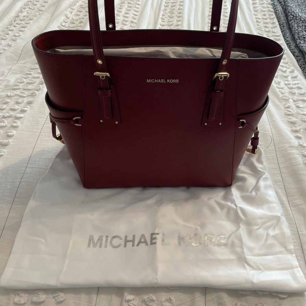 New Never used Michael Kors burgundy purse